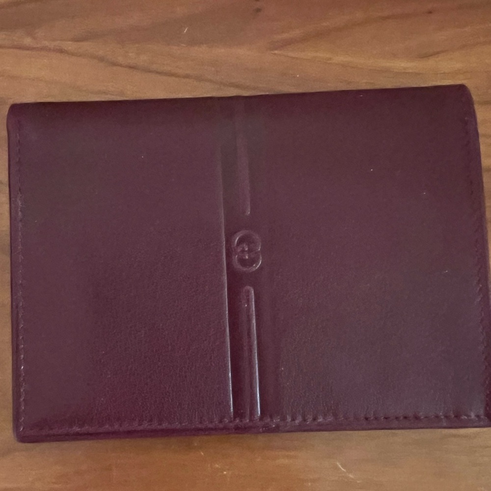 Gucci 
New, never used Gucci Vintage square wallet